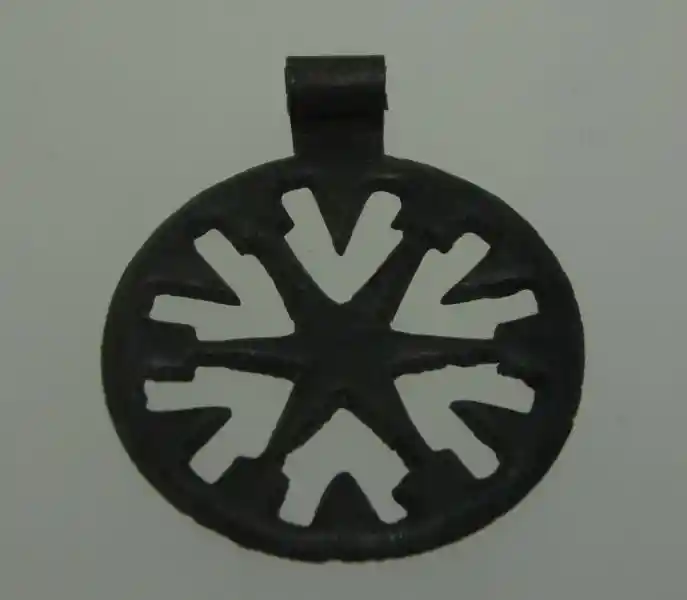A pendant with a six-point cross inside a circle